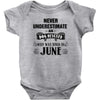 never underestimate an old man who was born in june Baby Onesie