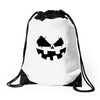 pumpkin face Drawstring Bags