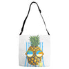 pineapple sunbathe Adjustable Strap Totes