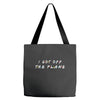 i got off the plane Tote Bags