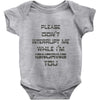 don't interrupt me Baby Onesie