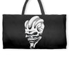alien skull Weekender Totes