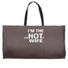 im the hot wife Weekender Totes