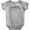 the guy with the gun Baby Onesie