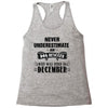 never underestimate an old man who was born in december Racerback Tank