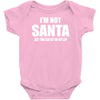i'm not santa but sit on my lap Baby Onesie