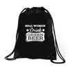 real women drink green beer Drawstring Bags