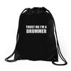 trust me i'm a drummer Drawstring Bags