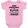 never underestimate an old man who was born in january Baby Onesie