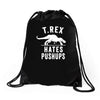t rex hates pushups Drawstring Bags