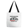 installing muscles Tote Bags
