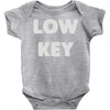low key Baby Onesie