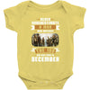 Never Underestimate A Man Who Watches The 100 And Was Born in December Baby Bodysuit
