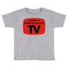 as seen in front of the the tv Toddler T-shirt
