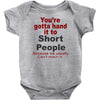 hand it to short people Baby Bodysuit