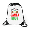 working on my santa body Drawstring Bags