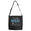 i'm a good nurse i just cuss a lot Adjustable Strap Totes