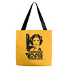 a woman's place is in the resistance Tote Bags