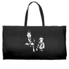 charlie chaplin the kid Weekender Totes