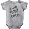 i don't care Baby Bodysuit