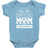 paid in hugs Baby Onesie