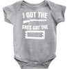 she's got the rack Baby Onesie