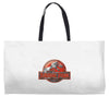 jurassic park Weekender Totes