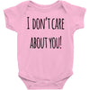 i don'tcare about you Baby Bodysuit