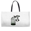 breaking through to freedom Weekender Totes