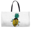 pineapple skateboarding Weekender Totes