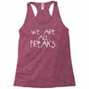 we are all freaks Racerback Tank