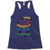 caring for animals isn't what i do it's who i am Racerback Tank