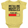 new installing muscle Baby Onesie