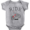 ride and fly high Baby Onesie