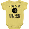 real cars don't shift themselves Baby Bodysuit