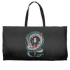 the girl and the dragon Weekender Totes