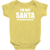 i'm not santa but sit on my lap Baby Onesie