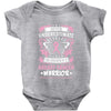 Never Underestimate The Strength Of A Breast Cancer Warrior Baby Bodysuit