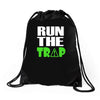run the trap Drawstring Bags