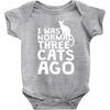 i was normal three cats ago lol funny cat Baby Onesie