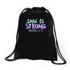 she is strong Drawstring Bags