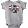 i don't give a crappe Baby Bodysuit