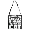 Being an adult is hard I'd rather be a cat Adjustable Strap Totes
