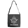 The best teachers are born in december Adjustable Strap Totes