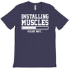 installing muscles funny T-Shirt