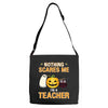 nothing scares me i'm a teacher Adjustable Strap Totes