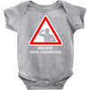 body under construction road sign Baby Onesie