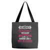 they call me grandma partner in crime. Tote Bags