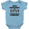never underestimate an old man who was born in february Baby Onesie