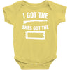 she's got the rack Baby Onesie